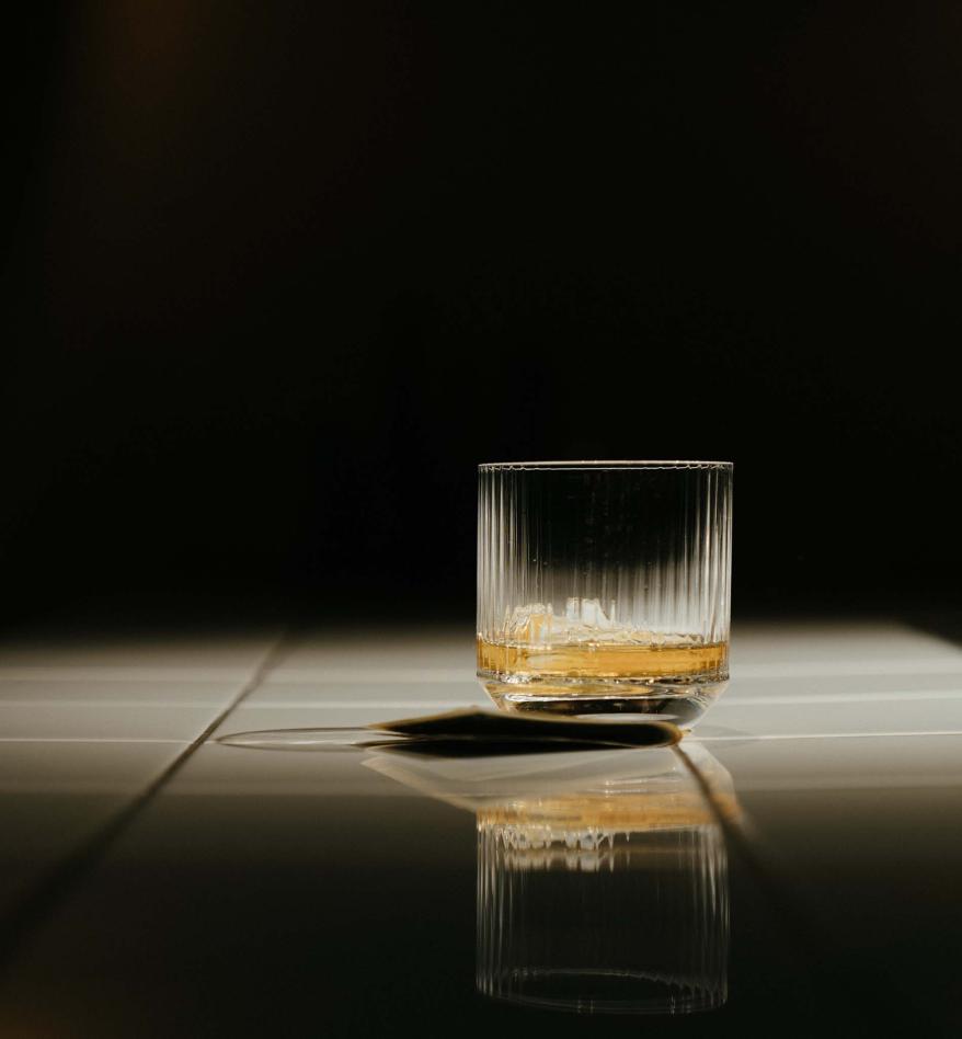 whiskey glass on table